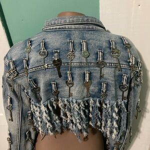 Akira Distressed Denim Jacket with Key Embellishments